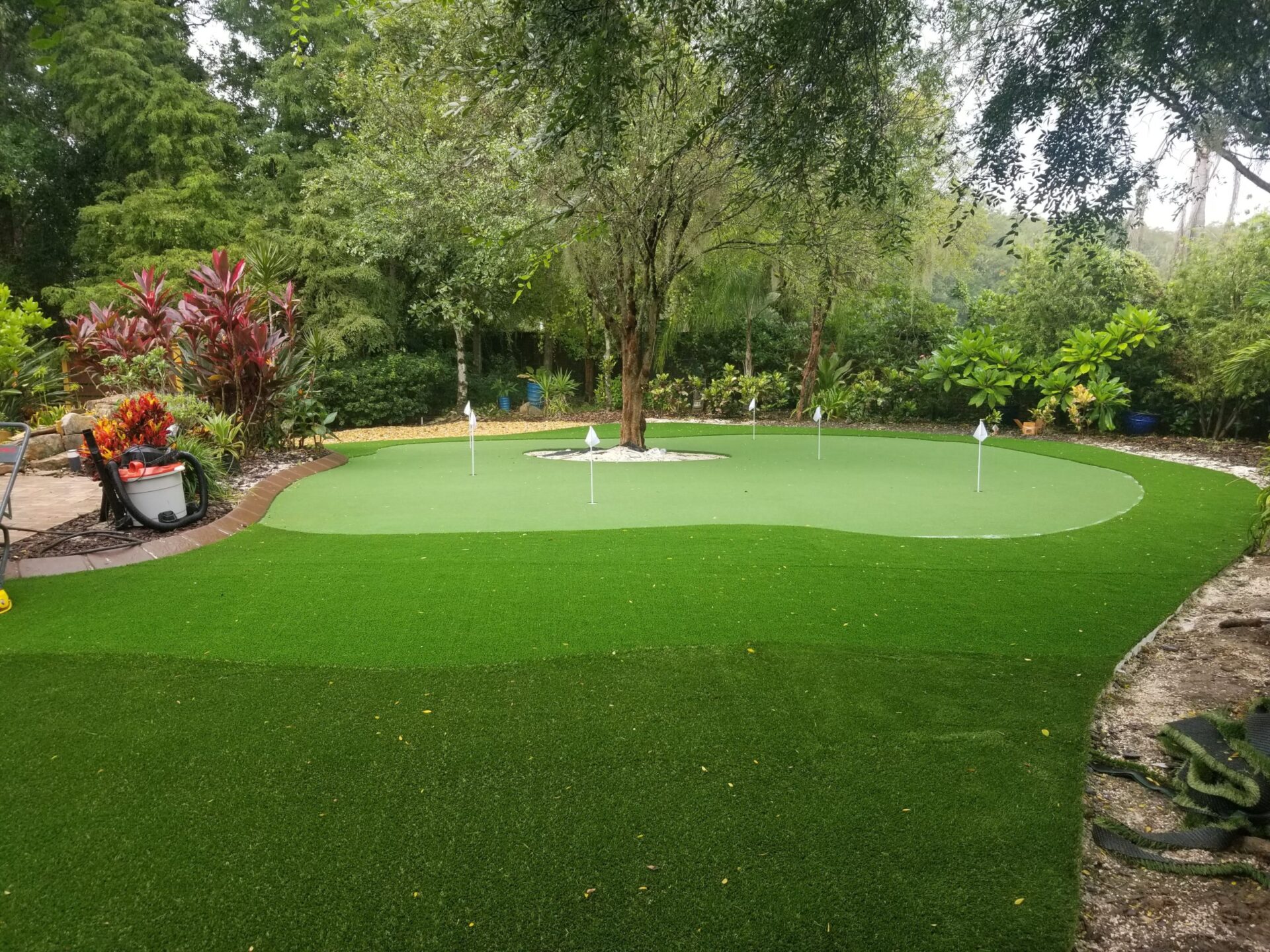 Artificial grass putting green installation